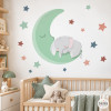 Sticker mural bébé avec éléphant dormant sur une lune verte, décoration murale pour chambre de bébé personnalisée.