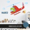 vinilos infantiles personalizados con nombre decorando la pared de una habitación infantil