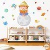 Vinilos para colegios y bibliotecas - Niño leyendo en la luna