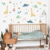 Vinilo decorativo infantil baby dinos con dinosaurios pequeños, arcoíris y plantas para habitación de bebé