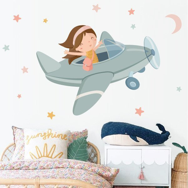 Decoración infantil - Niña viajando en avión - Vinilos decorativos