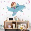 Decoración infantil - Niña viajando en avión - Vinilos decorativos