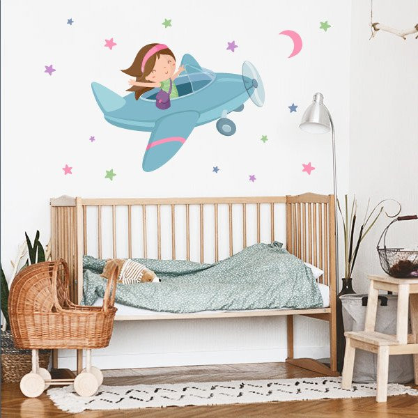 Decoración infantil - Niña viajando en avión - Vinilos decorativos