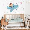 Decoración infantil - Niña viajando en avión - Vinilos decorativos