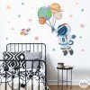 Vinilos infantiles - Astronauta con planetas - Decoración habitaciones infantiles