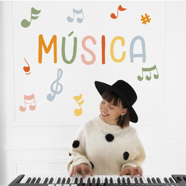 Vinil decoratiu amb la paraula Música + notes musicals