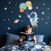vinilos infantiles para niños Astronauta con planetas