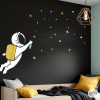 Sticker mural astronaute style graffiti avec étoiles pour chambre adolescent
