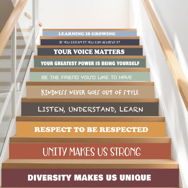 Decoració d’escales escolars. Vinils amb frases de cohesió escolar