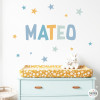 Personalized kids’ wall decal with name and soft‑colored stars.