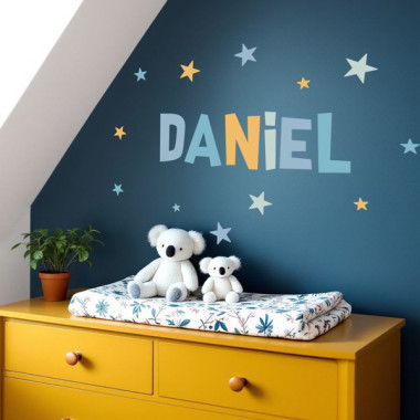 Personalized kids’ wall decal with name and soft‑colored stars.