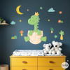 Vinilo infantil bebé dinosaurio con luna, palmeras, nubes y estrellas para decorar pared de habitación de bebé