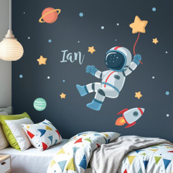 Vinilos infantiles niño astronauta en espacio con estrella. Pegatinas de pared para niños