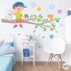 Sticker enfant - Garçon sur la branche d'arbre