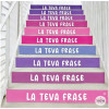 Vinilos decorativos en escaleras de colegio con frases motivadoras en color lila