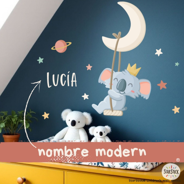 Children’s wall decal featuring a koala on the moon with a swing in the baby room