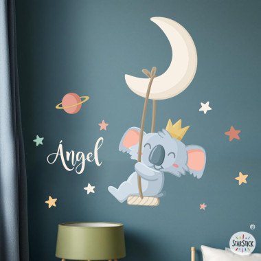 Children’s wall sticker of a koala swinging on the moon with stars for baby nursery wall decoration