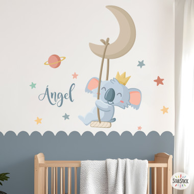 Children’s wall sticker of a koala swinging on the moon with stars for baby nursery wall decoration