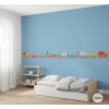 Cenefa infantil amb cotxes de colors a la paret d’una habitació infantil