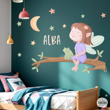 Children’s fairy wall decal sitting on a tree branch with moon, stars and personalised name for baby and girls bedroom decor