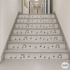 Vinils decoratius per a escales amb disseny de partitura musical
