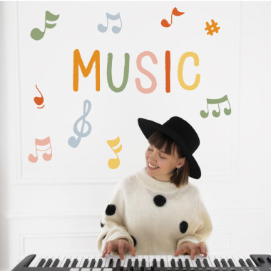 Sticker with the word Music + musical notes